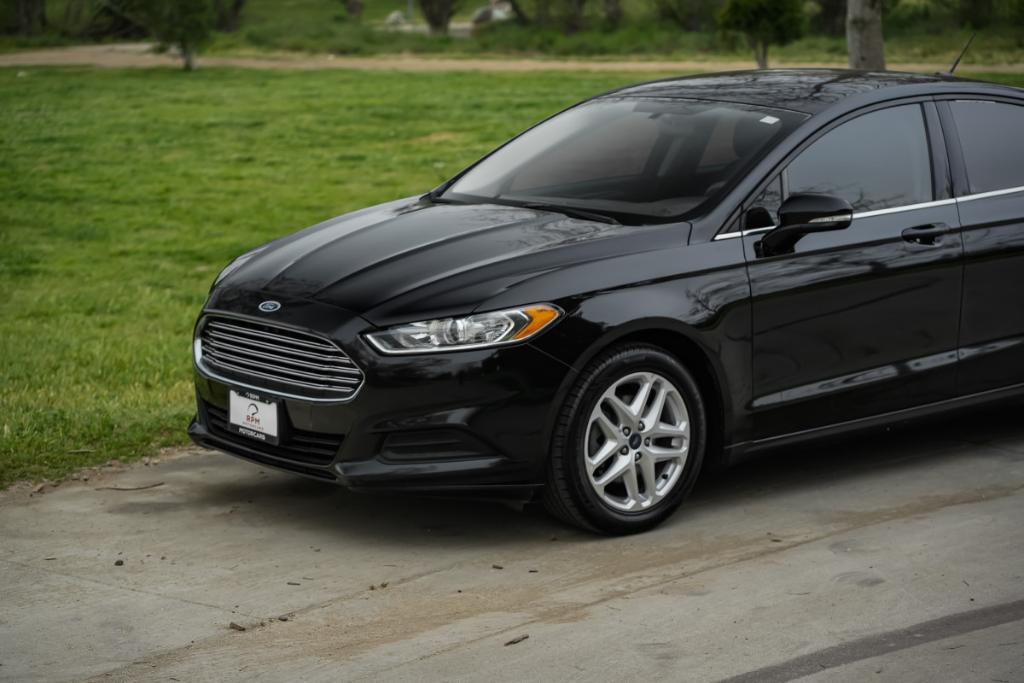 used 2016 Ford Fusion car, priced at $7,980