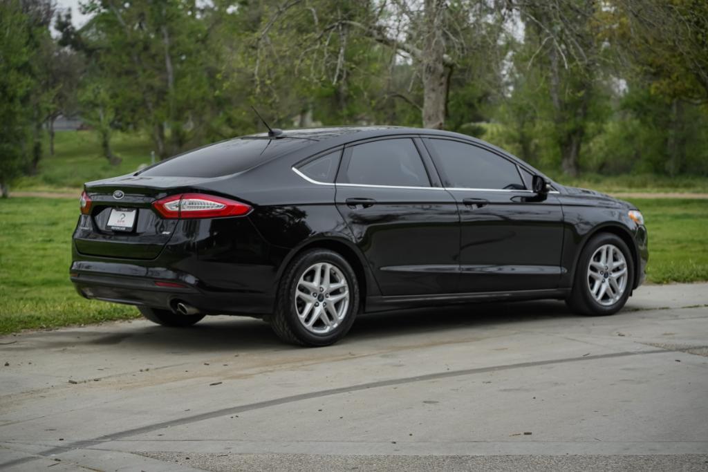 used 2016 Ford Fusion car, priced at $7,980