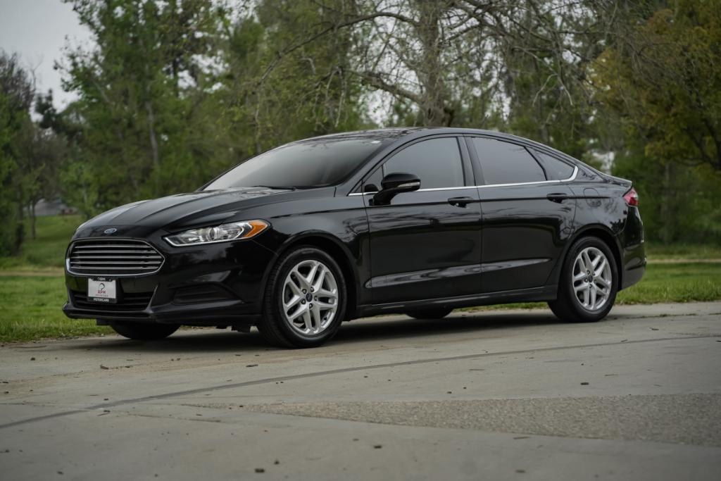 used 2016 Ford Fusion car, priced at $7,980