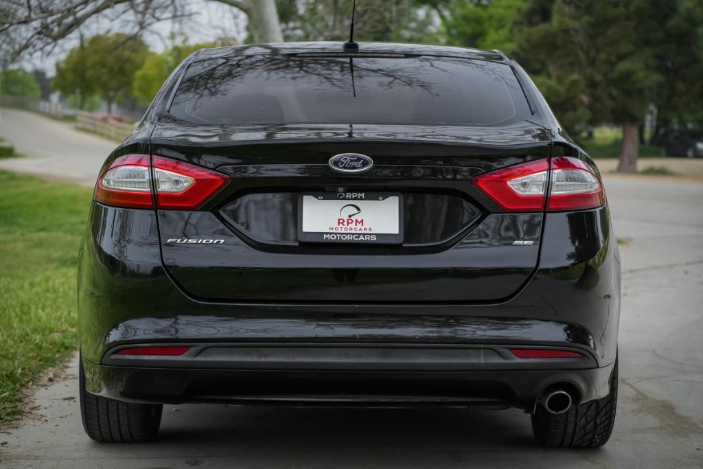 used 2016 Ford Fusion car, priced at $7,980