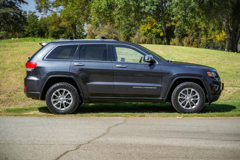 used 2014 Jeep Grand Cherokee car, priced at $13,480