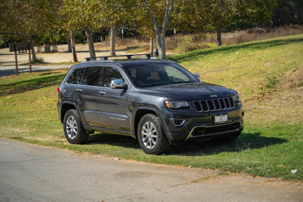 used 2014 Jeep Grand Cherokee car, priced at $13,480