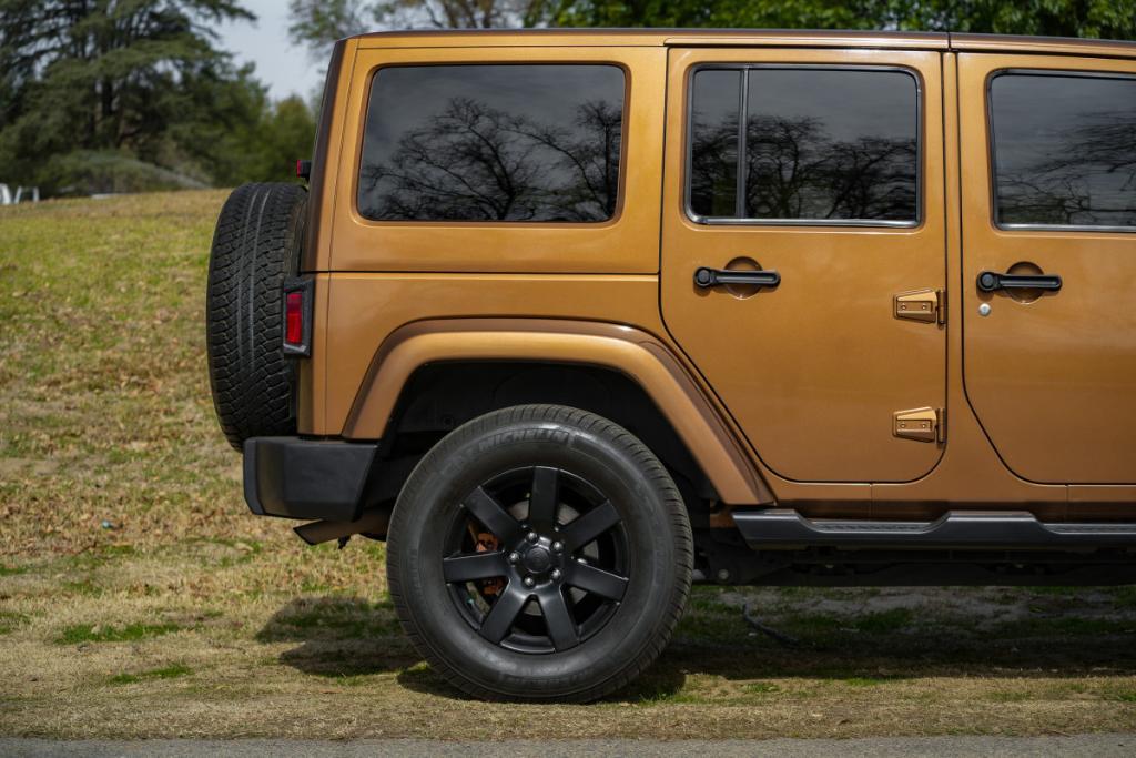 used 2011 Jeep Wrangler Unlimited car, priced at $16,980