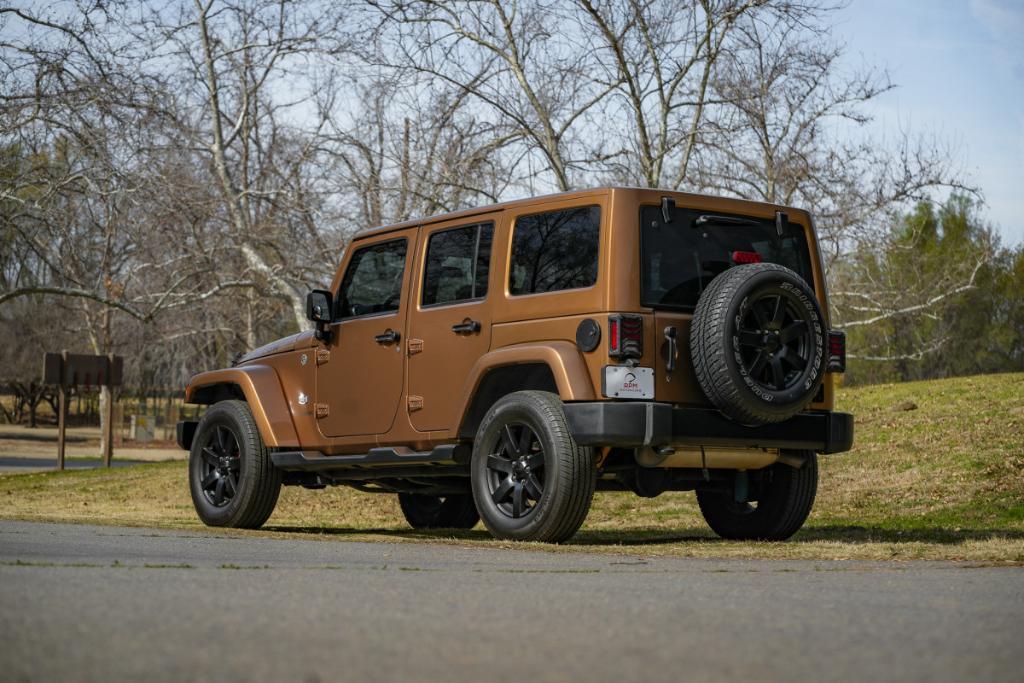 used 2011 Jeep Wrangler Unlimited car, priced at $16,980