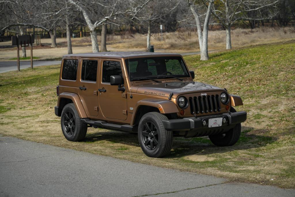 used 2011 Jeep Wrangler Unlimited car, priced at $16,980