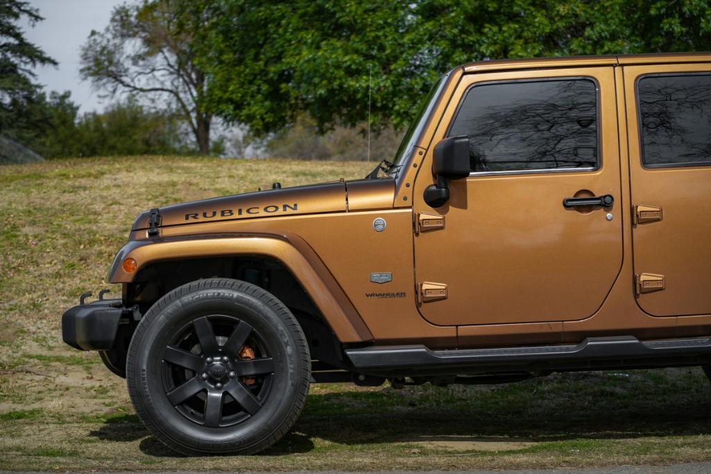 used 2011 Jeep Wrangler Unlimited car, priced at $16,980