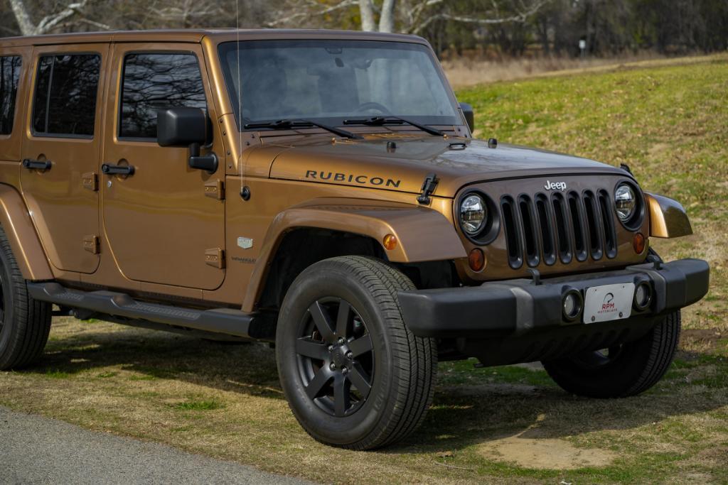 used 2011 Jeep Wrangler Unlimited car, priced at $16,980