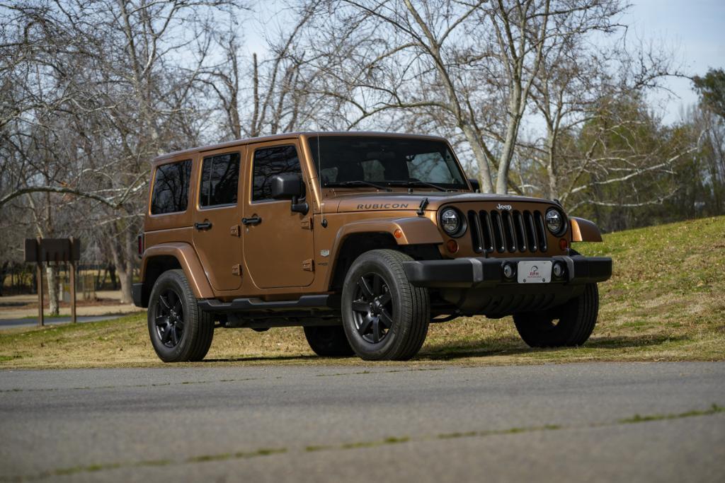 used 2011 Jeep Wrangler Unlimited car, priced at $16,980