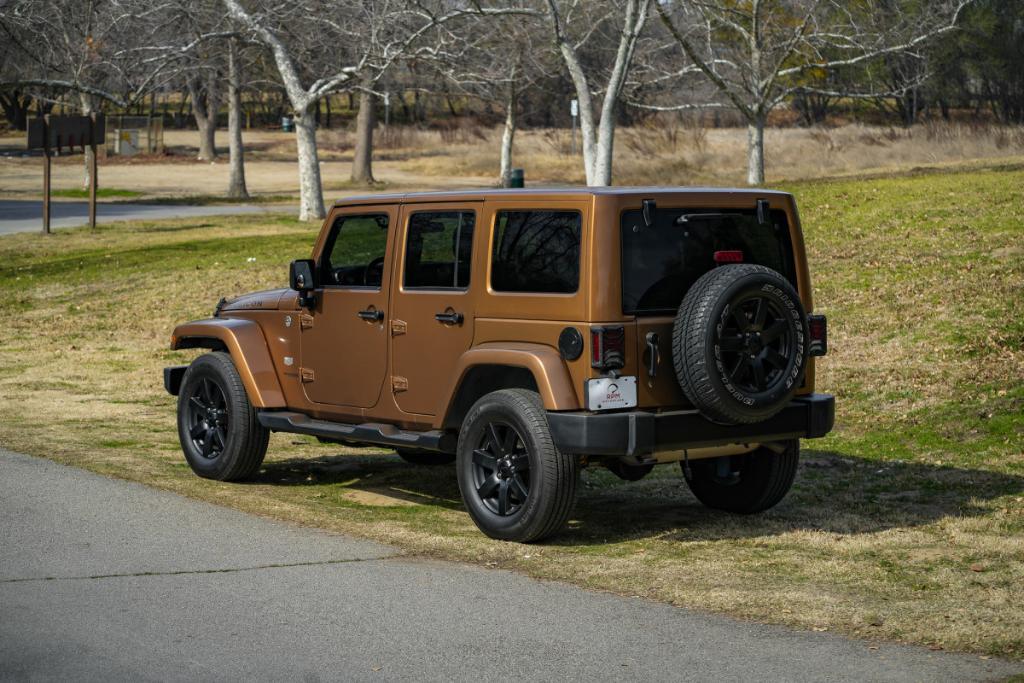 used 2011 Jeep Wrangler Unlimited car, priced at $16,980