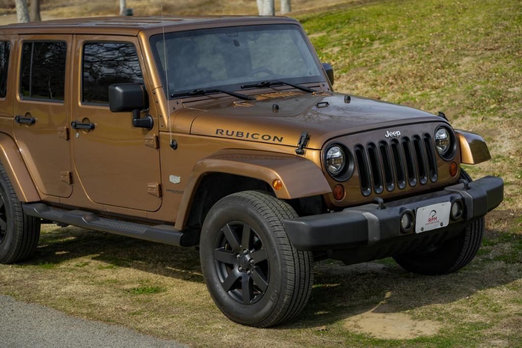 used 2011 Jeep Wrangler Unlimited car, priced at $16,980