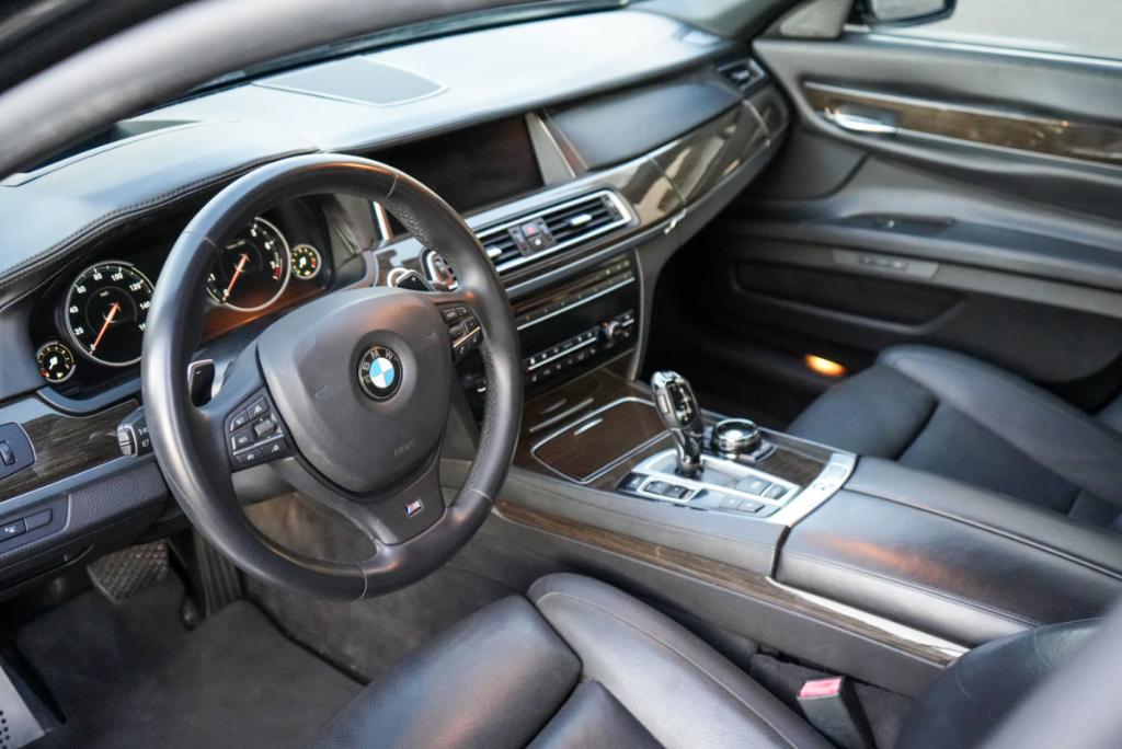 used 2015 BMW 750 car, priced at $15,980