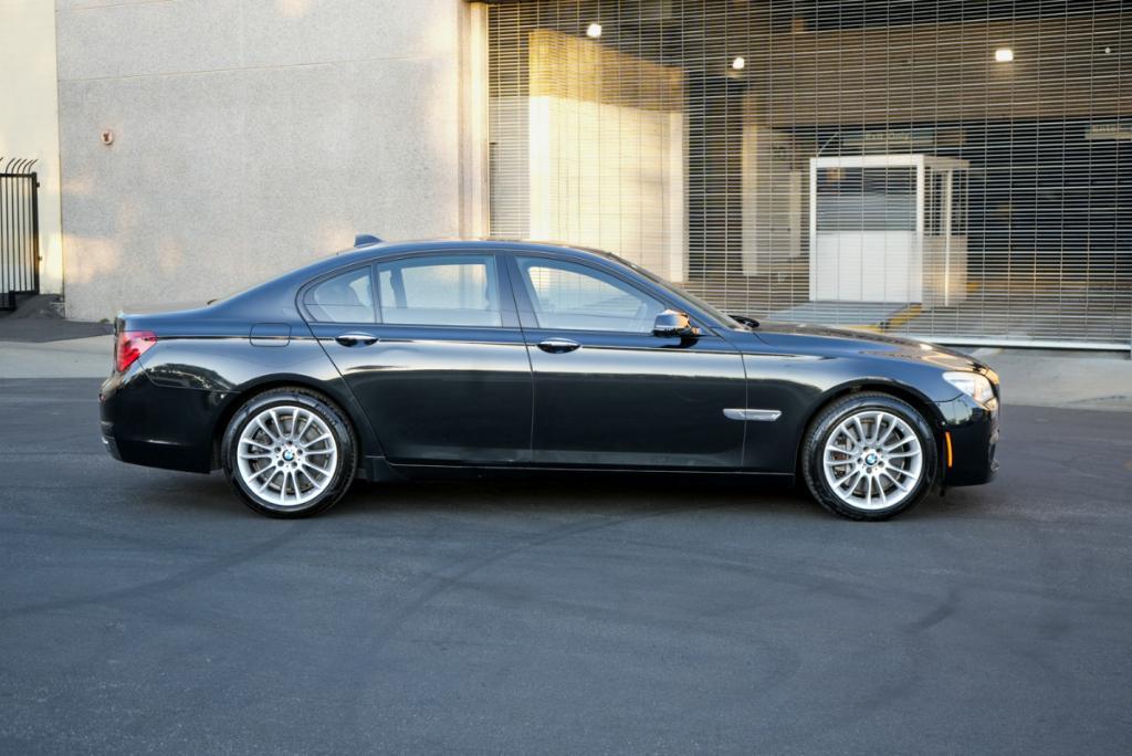 used 2015 BMW 750 car, priced at $15,980