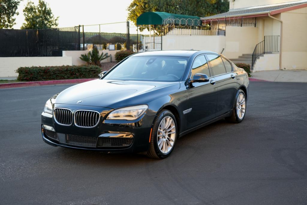 used 2015 BMW 750 car, priced at $15,980