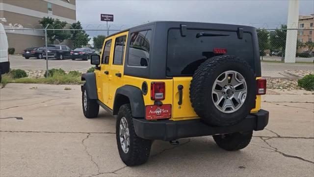 used 2015 Jeep Wrangler Unlimited car, priced at $25,987
