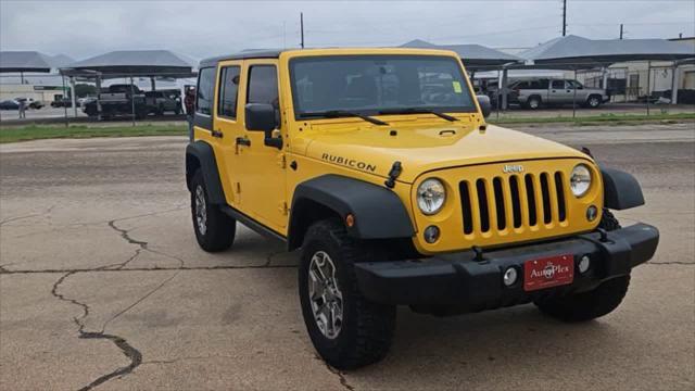 used 2015 Jeep Wrangler Unlimited car, priced at $25,987