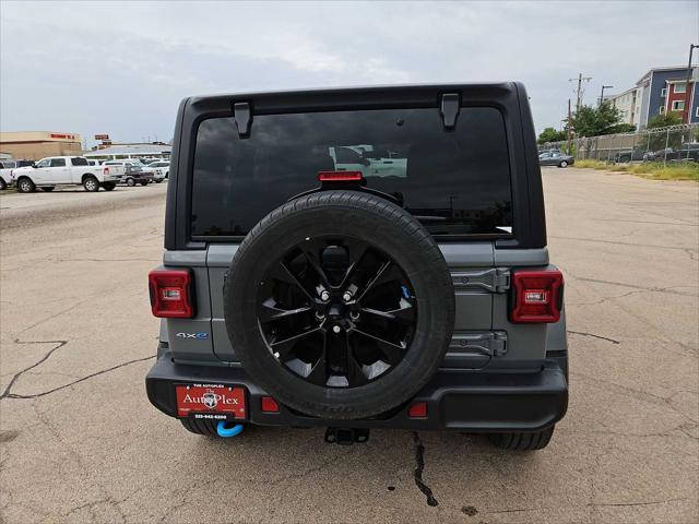 used 2023 Jeep Wrangler 4xe car, priced at $33,528
