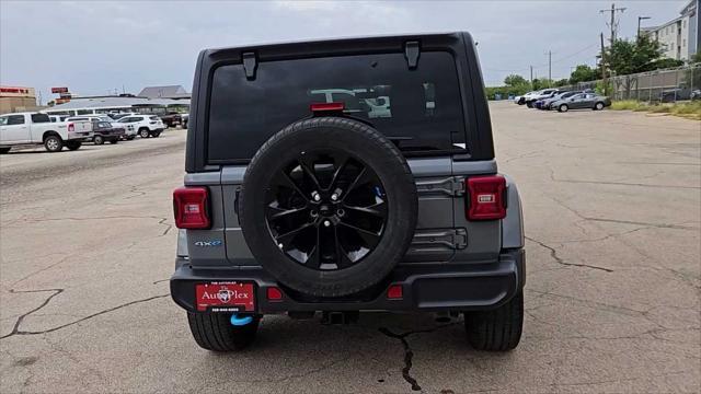 used 2023 Jeep Wrangler 4xe car, priced at $33,528