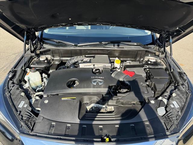 used 2024 INFINITI QX50 car, priced at $38,800