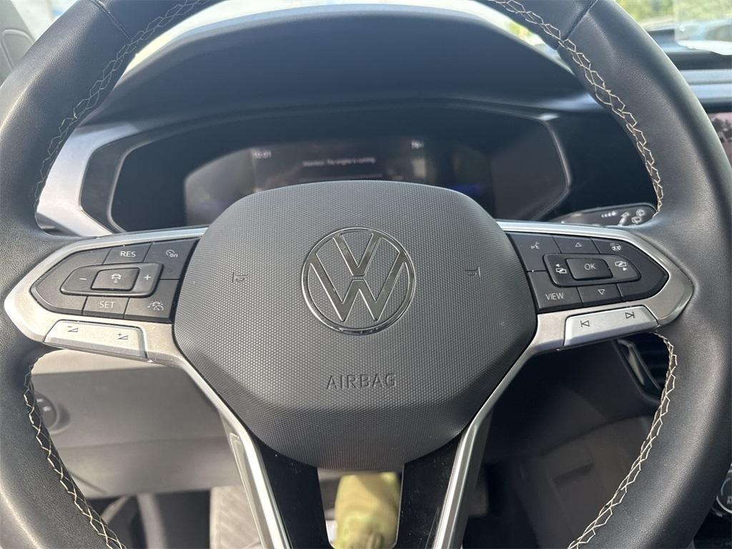 used 2023 Volkswagen Taos car, priced at $20,999