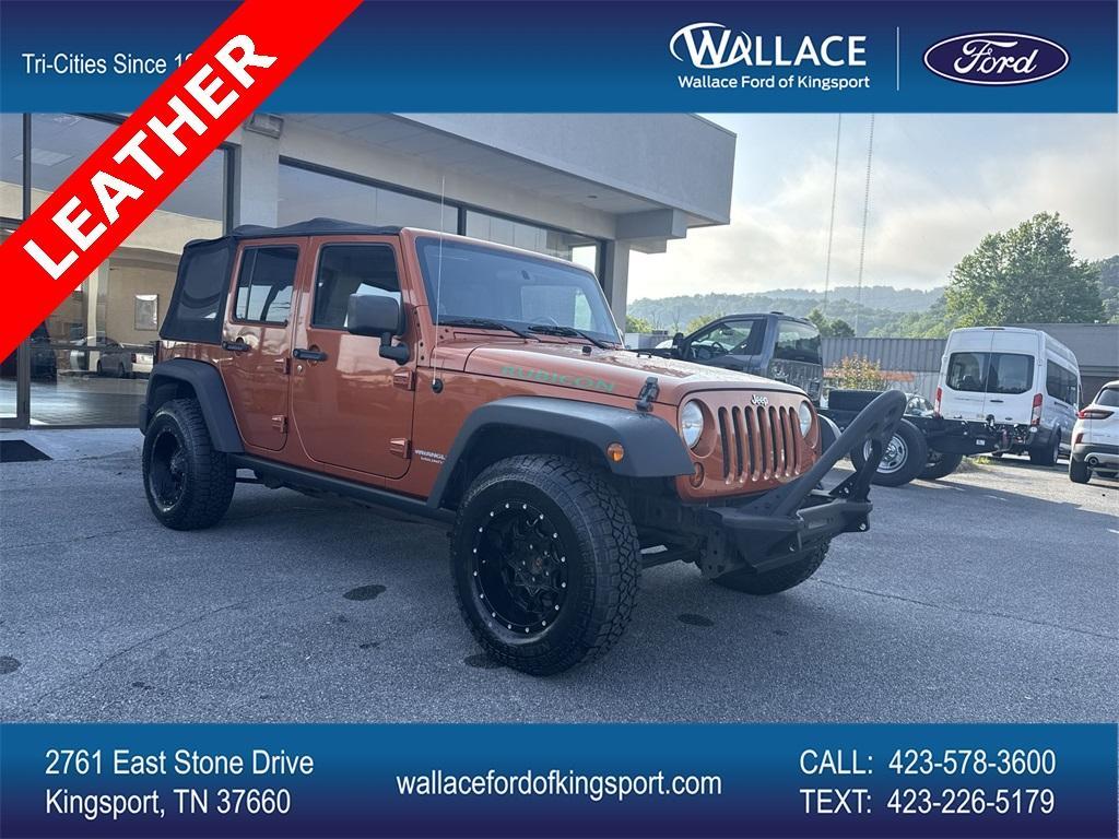 used 2011 Jeep Wrangler Unlimited car, priced at $14,850