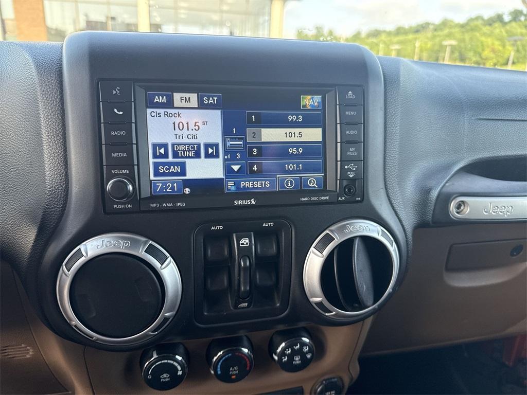 used 2011 Jeep Wrangler Unlimited car, priced at $14,850