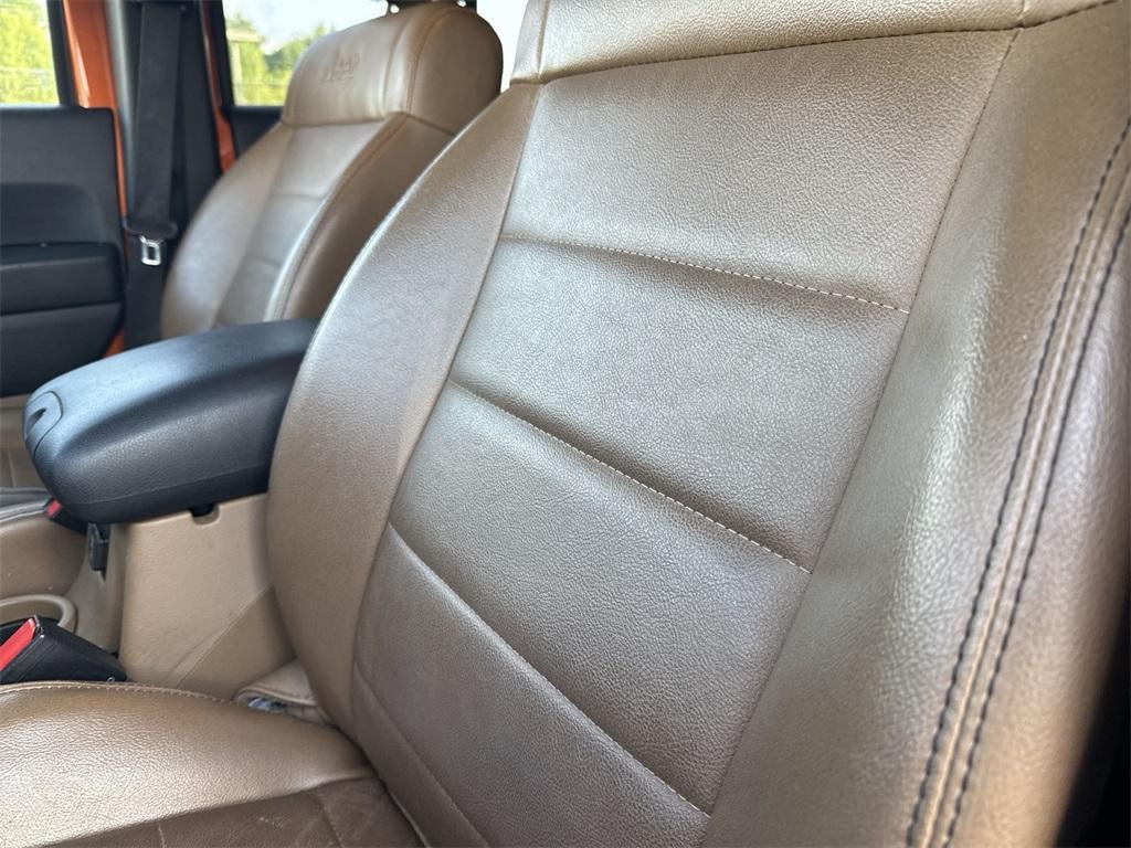 used 2011 Jeep Wrangler Unlimited car, priced at $14,850