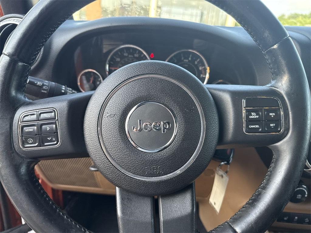 used 2011 Jeep Wrangler Unlimited car, priced at $14,850