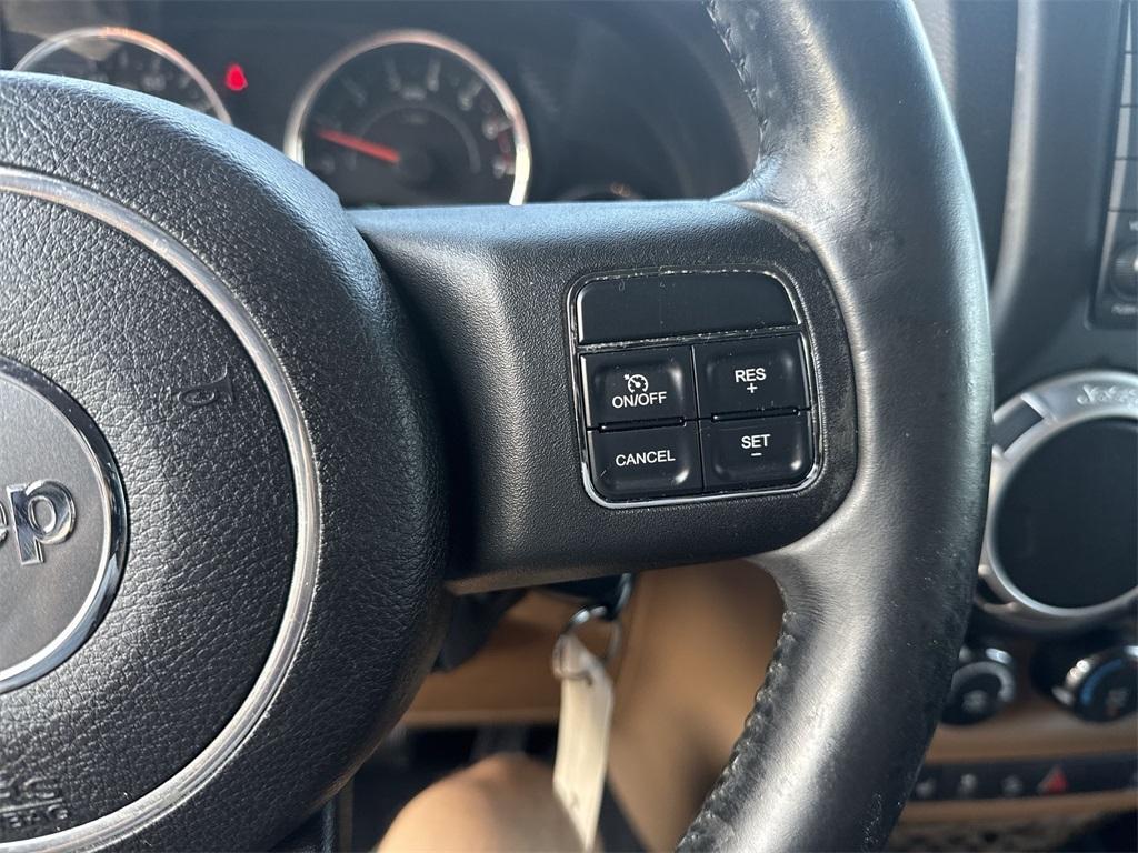 used 2011 Jeep Wrangler Unlimited car, priced at $14,850