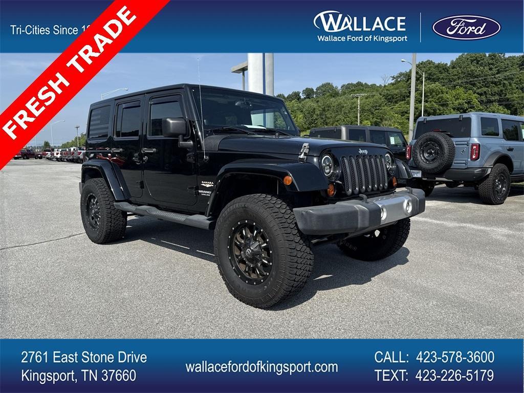 used 2013 Jeep Wrangler Unlimited car, priced at $18,900