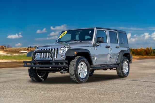 used 2016 Jeep Wrangler Unlimited car, priced at $19,894