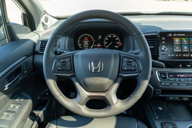 used 2025 Honda Ridgeline car, priced at $40,394