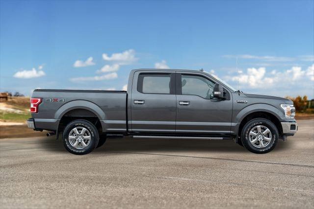 used 2018 Ford F-150 car, priced at $26,294