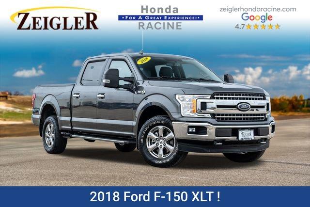 used 2018 Ford F-150 car, priced at $26,594