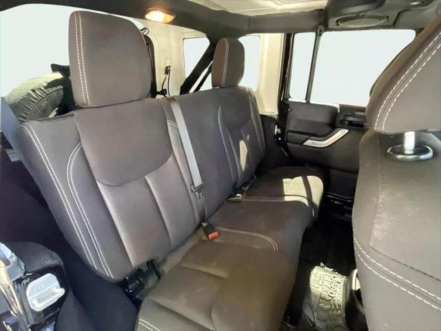 used 2013 Jeep Wrangler Unlimited car, priced at $18,990