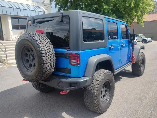 used 2016 Jeep Wrangler Unlimited car, priced at $28,312