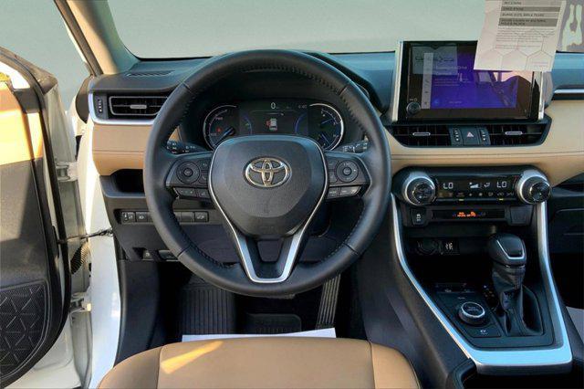 used 2024 Toyota RAV4 Hybrid car, priced at $31,900