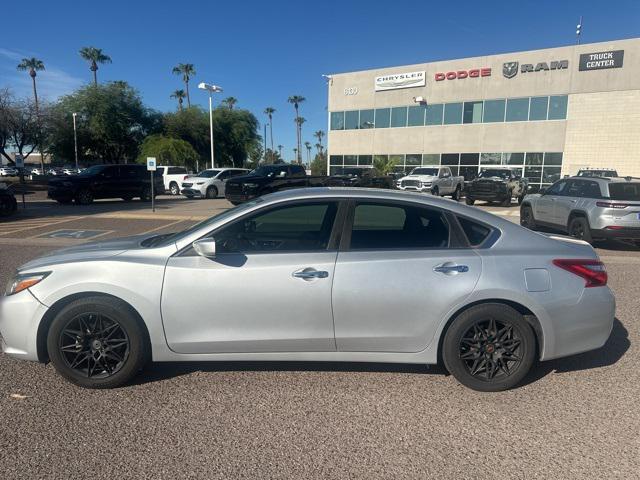 used 2017 Nissan Altima car, priced at $12,000