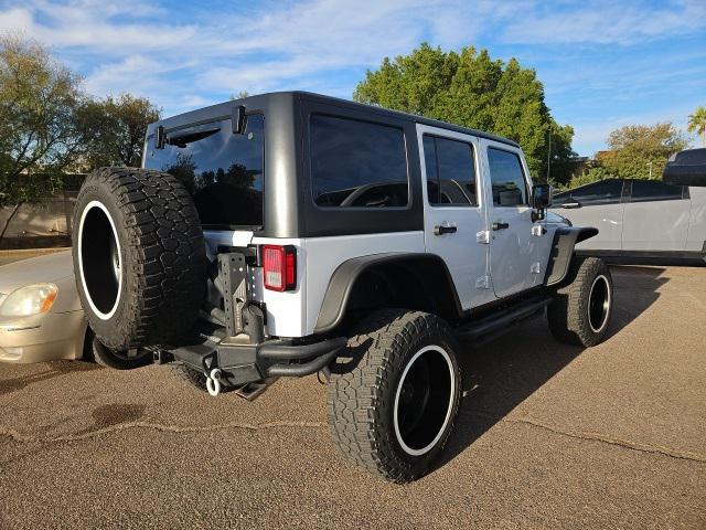 used 2017 Jeep Wrangler Unlimited car, priced at $23,900