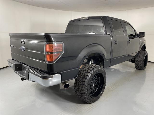 used 2013 Ford F-150 car, priced at $15,000