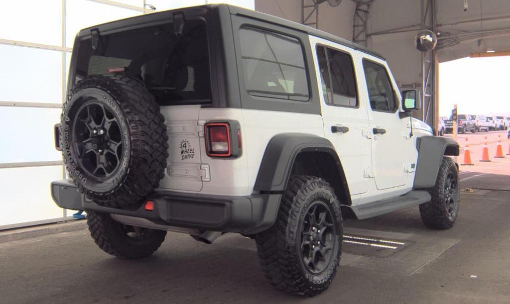 used 2023 Jeep Wrangler 4xe car, priced at $30,900