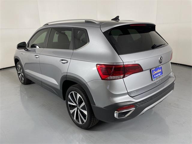 used 2024 Volkswagen Taos car, priced at $18,100