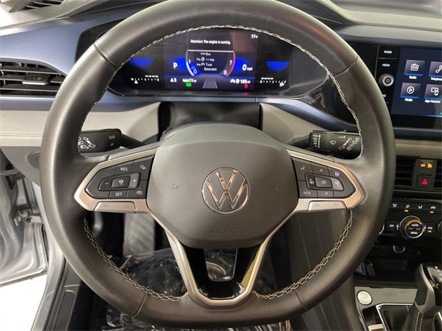 used 2024 Volkswagen Taos car, priced at $18,100