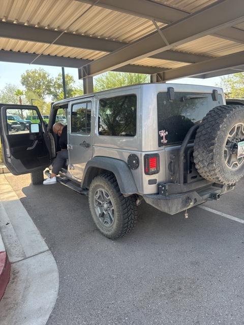 used 2017 Jeep Wrangler Unlimited car, priced at $21,900