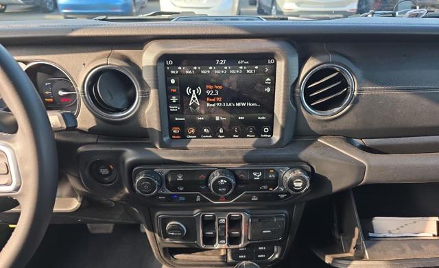 used 2023 Jeep Wrangler 4xe car, priced at $31,830