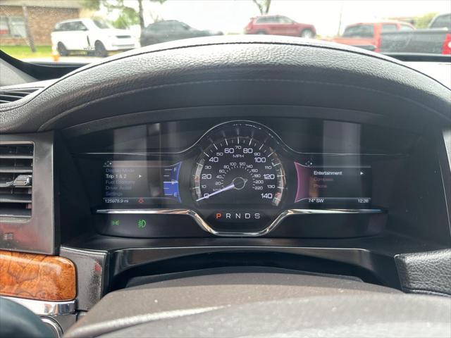 used 2015 Lincoln MKS car, priced at $12,950