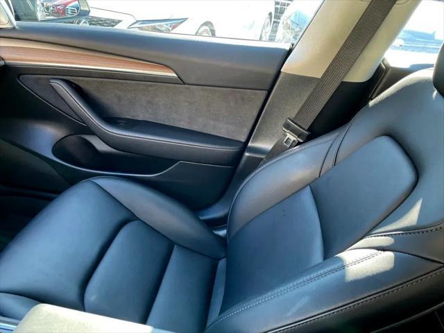 used 2023 Tesla Model 3 car, priced at $30,800
