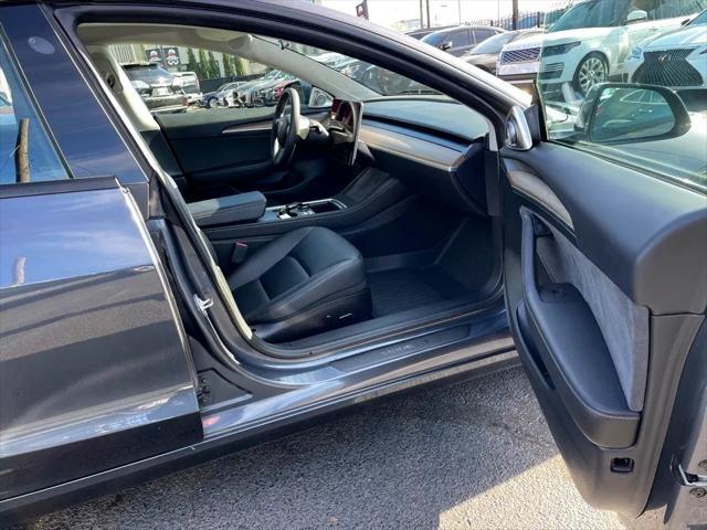 used 2023 Tesla Model 3 car, priced at $30,800