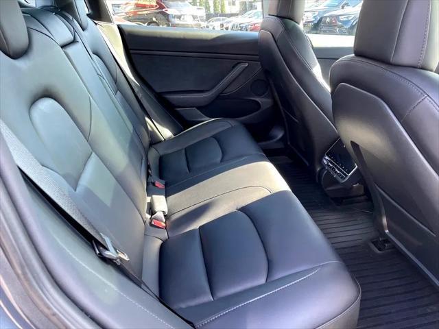 used 2023 Tesla Model 3 car, priced at $30,800
