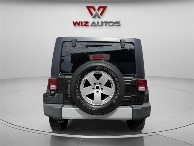 used 2011 Jeep Wrangler Unlimited car, priced at $7,897