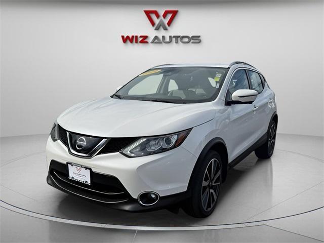 used 2019 Nissan Rogue Sport car, priced at $19,116
